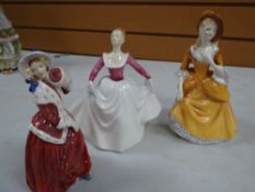 Three boxed Royal Doulton figures 'Lisa' - HN3265, 'Sandra' - HN2275 & 'Christmas Morn' - HN1992