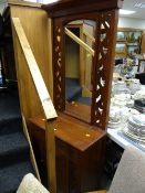 A compact single-drawer mirror back sideboard