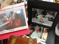 A small parcel of cinema lobby cards including 'Silver Dream Racer', 'Gloria', 'Table for Five', '