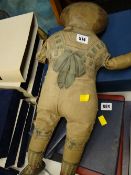 An interesting unknown cloth doll with dyed pantaloons, striped socks and hair, the feet with 'Trade