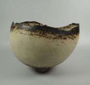 OGWYN DAVIES stoneware - eggshell-form bowl raised over a circular foot, signed with impressed