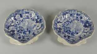 A PAIR OF SWANSEA POTTERY PICKLE-DISHES in the form of scallop shells on two pointed feet with