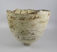 OGWYN DAVIES stoneware - of naturalistic form with textured & mottled body bowl raised over a