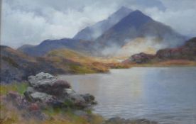 ALFRED OLIVER oil on panel - Snowdonia with lake and peaks, signed, 15 x 23cms