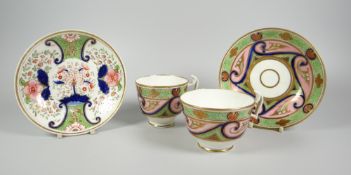 A SWANSEA PORCELAIN TRIO pattern no. 478 with seeded green border & scrolls with cobalt-blue detail,