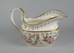 A SWANSEA PORCELAIN CREAM JUG with wide elongated spout, high loop handle with thumb spur, decorated