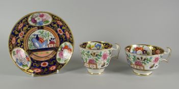 A SWANSEA 'JAPAN' TEA & COFFEE TRIO decorated in the Imari palette with reserves of garden flowers
