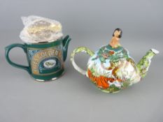 Disney Showcase teapot titled 'Jungle Book' and a novelty teapot in the form of a Lyle's Golden