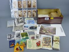 Vintage tin and a sleeved quantity of collector's cards, filmstars, football, sports, space etc,