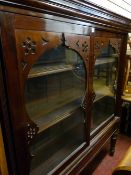 Victorian mahogany sliding door bookcase on stand