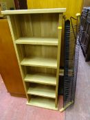 Small five shelf bookcase and a modern metal CD rack