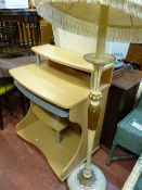 Modern desk and a vintage cream standard lamp