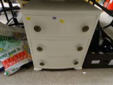 Painted narrow chest of three drawers and a highback office chair