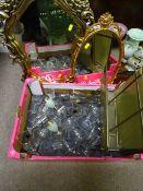 Two gilt framed wall mirrors, a vintage magazine rack and a box of drinking glassware