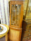 Light wood upper glazed corner cupboard