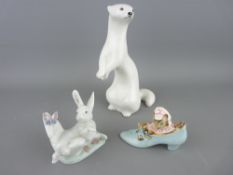 Lladro bunny and butterfly and a Beswick Beatrix Potter figure 'The Old Woman Who Lived In a Shoe'