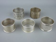 Five hallmarked silver napkin rings