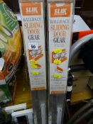 Pair of sliding door accessories by Slik