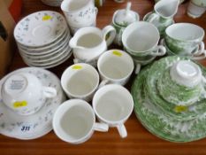 Royal Doulton 'Strawberry Fair' part teaset and a traditional cottage style part teaset with green