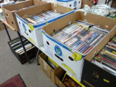Four boxes with very large quantity of DVDs