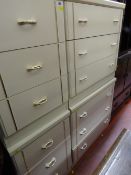 Pair of modern cream three drawer bedside cabinets, a pair of matching three drawer chests and a