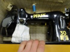 Cased vintage sewing machine by Pfaff