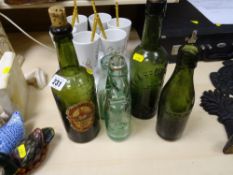 Parcel of old soda bottles including Ind Coope and a bottle with a marble