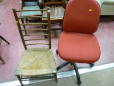 Ladderback rush seat chair and a modern red upholstered office chair