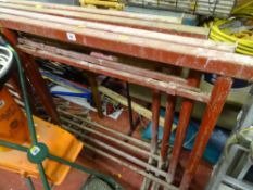 Set of four red scaffold trellises