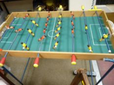 Tabletop football game on folding metal stand