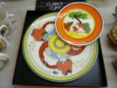 Boxed Clarice Cliff 'Bizarre' centenary plate, a Clarice Cliff Wedgwood plate and a Clarice Cliff '
