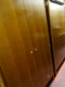 Bedroom suite of two double wardrobes, dressing tables and a pair of bedside cabinets