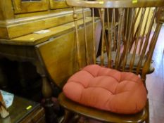 Oval drop leaf table and four chairs, maker 'Ethan Allen'