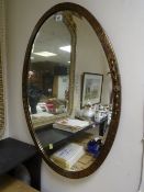 Vintage copper framed oval bevelled wall mirror
