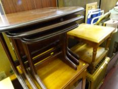 Nest of three tables and a small square two tier pine table