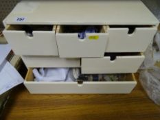 Painted multi-drawer box with haberdashery items