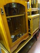 Two tier coffee table with glass inserts, a modern entertainment unit and a wooden and bamboo