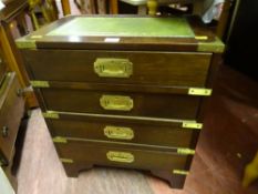 Tooled leather mahogany chest with brass mounts