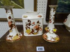 Pair of Masons 'Brown Velvet' candlesticks and a lidded tea caddy