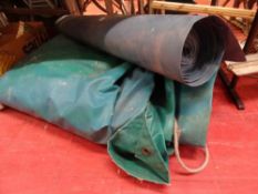 Roll of heavy duty plastic and a heavy tarpaulin