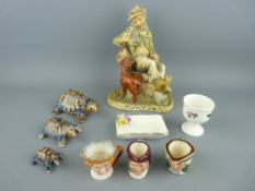 Naturecraft figure of a tramp, three Wade tortoise, three Doulton mini character jugs etc