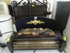 Modern log effect electric fire with a wrought iron sparkguard E/T