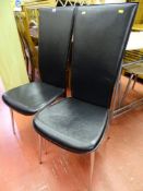 Two stylish black leather effect and chrome side chairs