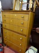Mid Century oak effect six drawer chest and a Lloyd loom style blanket box
