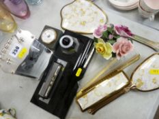 Vintage chrome and glass desk stand, modern mantel clock, gilt metal dressing table set etc