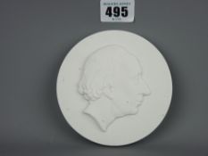 Royal Copenhagen circular plaque marked 'H C Andersen, 1805-1875' with profile in relief
