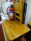 Modern pine kitchen table of neat proportions and two folding light wood chairs