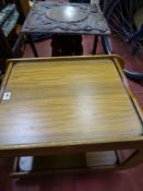 Mid Century teak two tier trolley and an Oriental carved dragon top folding side table
