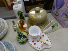 Stoneware cheese dome, fruit decorated pottery oil bottles etc