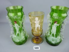 Pair of green Mary Gregory style vases and a similarly decorated amber goblet